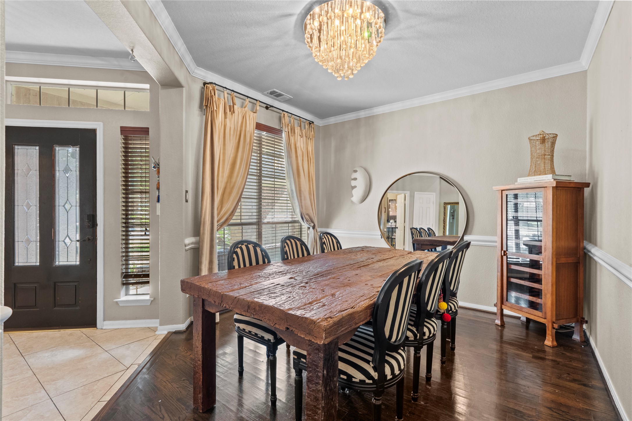 11514 Senna Ledge Court Houston, TX 77089 - Photo 4 of 48 a view of a dining room with furniture window and wooden floor