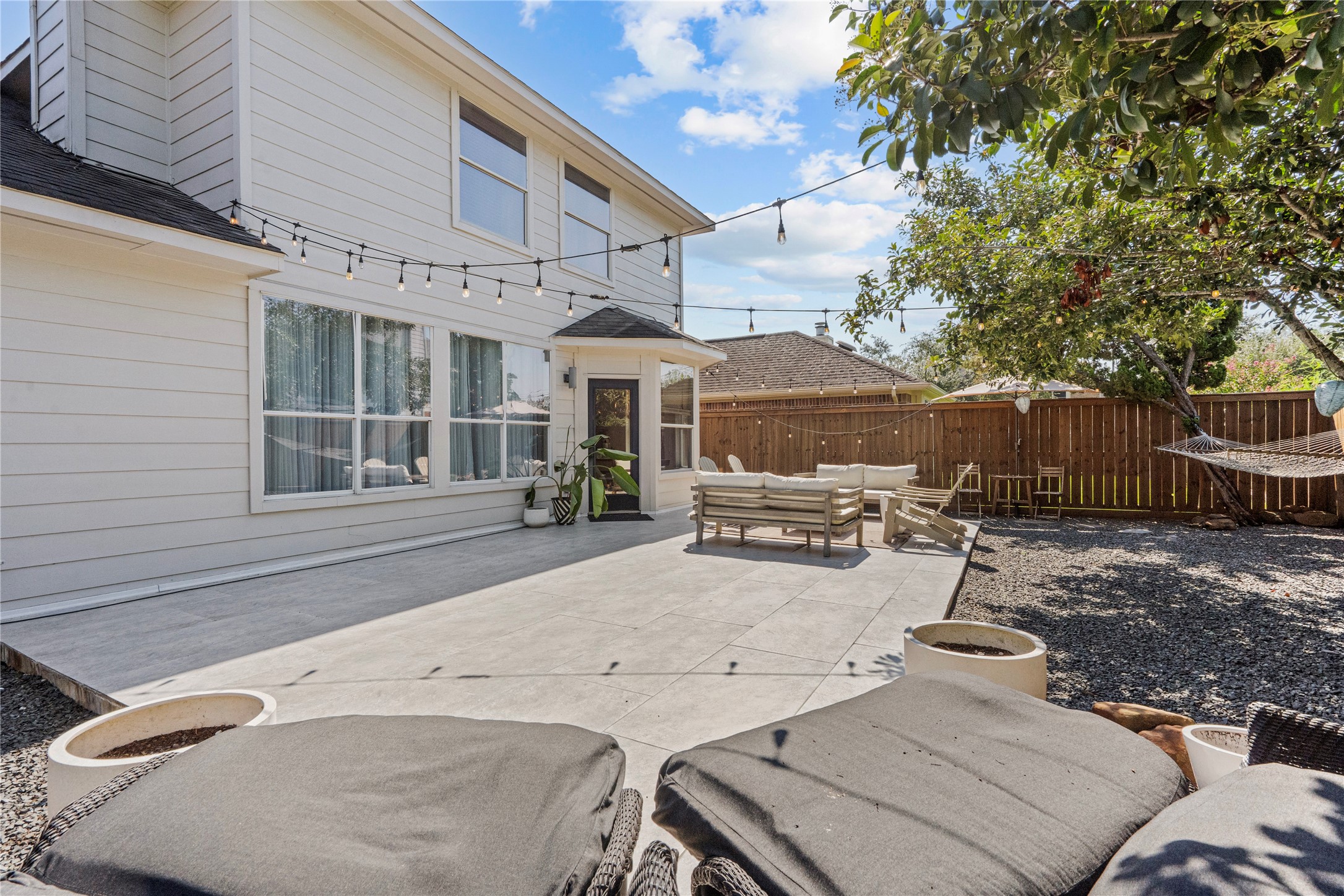 11514 Senna Ledge Court Houston, TX 77089 - Photo 41 of 48 a view of a patio with a table and chairs