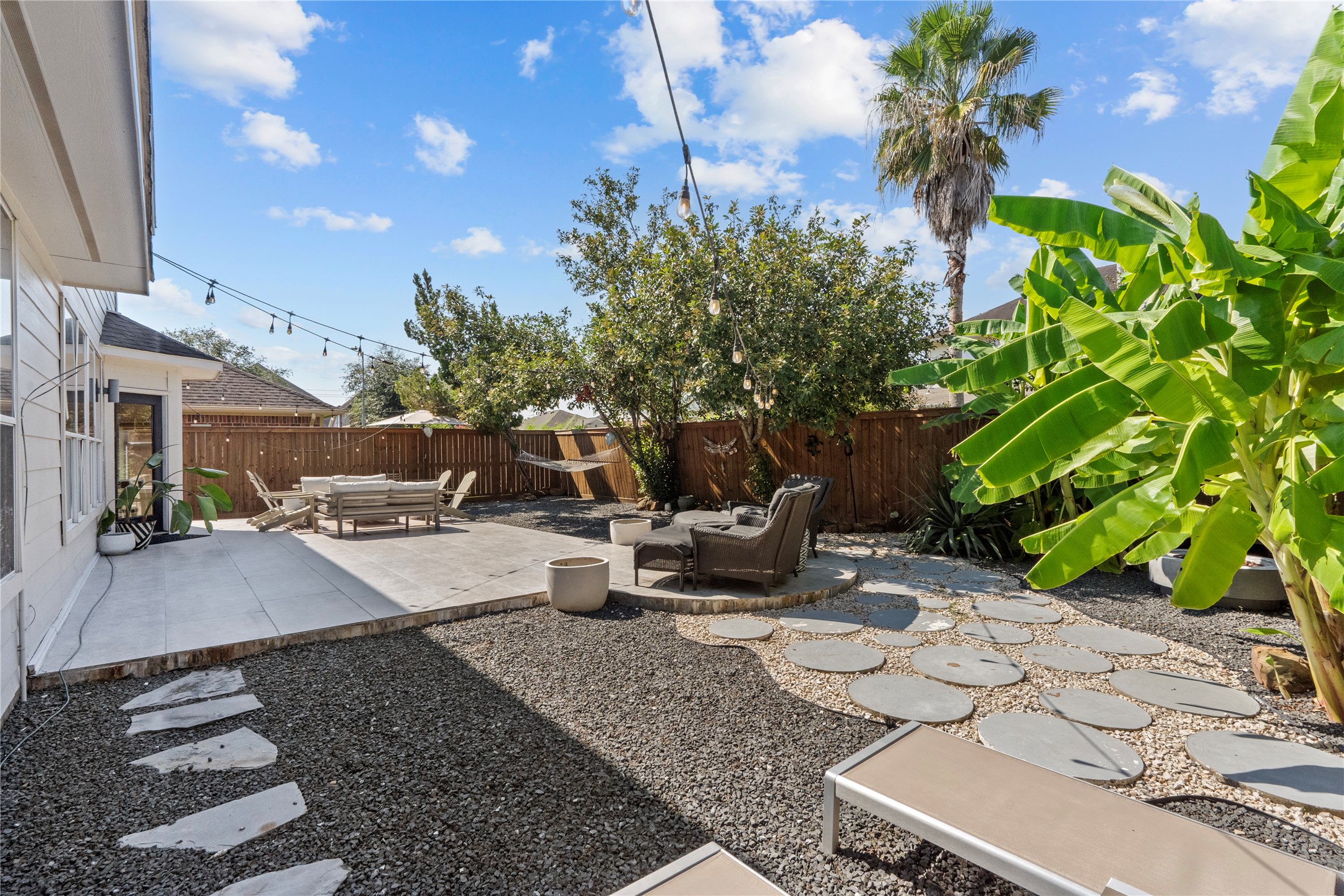 11514 Senna Ledge Court Houston, TX 77089 - Photo 42 of 48 a view of a backyard with sitting area