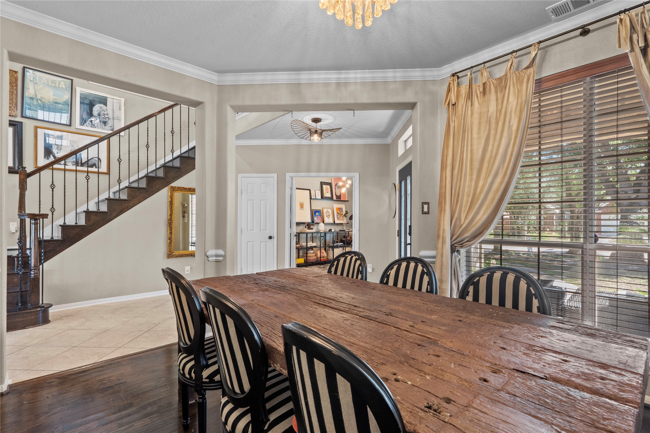 11514 Senna Ledge Court Houston, TX 77089 - Photo 5 of 48 a view of a dining room with furniture and stairs