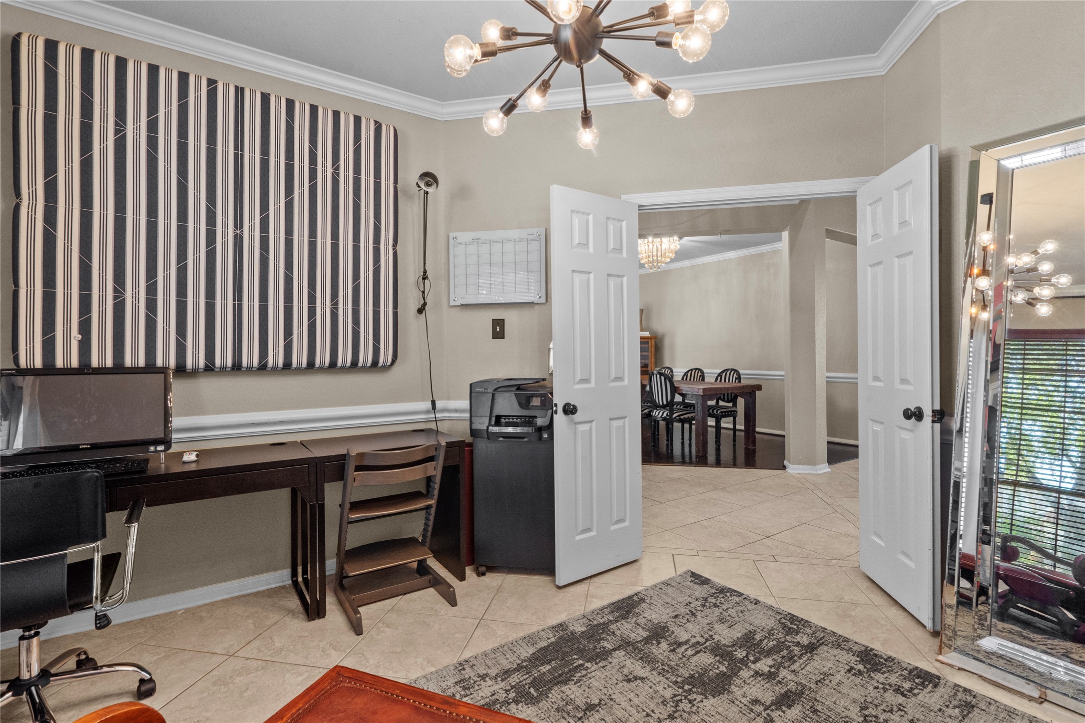 11514 Senna Ledge Court Houston, TX 77089 - Photo 8 of 48 a view of a workspace with furniture and a window