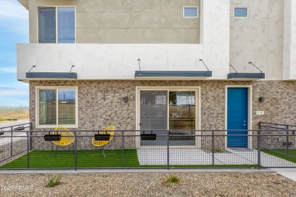 front view of a house with a patio