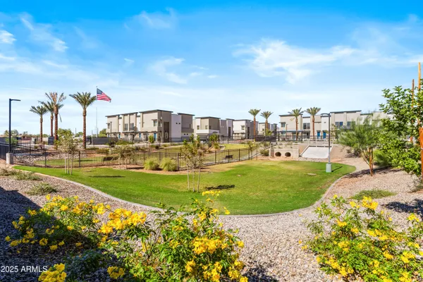 a view of a swimming pool and a yard