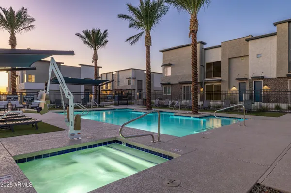 a view of a house with swimming pool