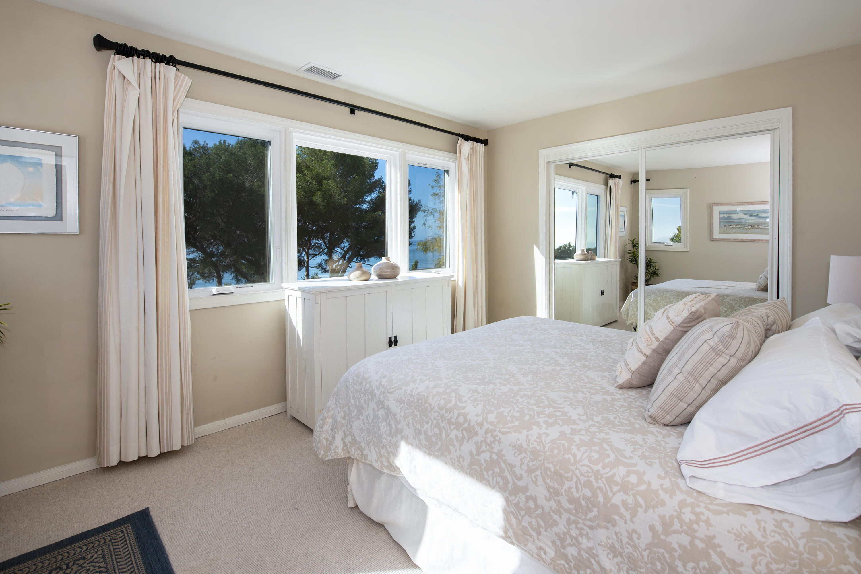 2525 Emerson Street Summerland, CA 93067 - Photo 15 of 26 a bedroom with a bed and a large window