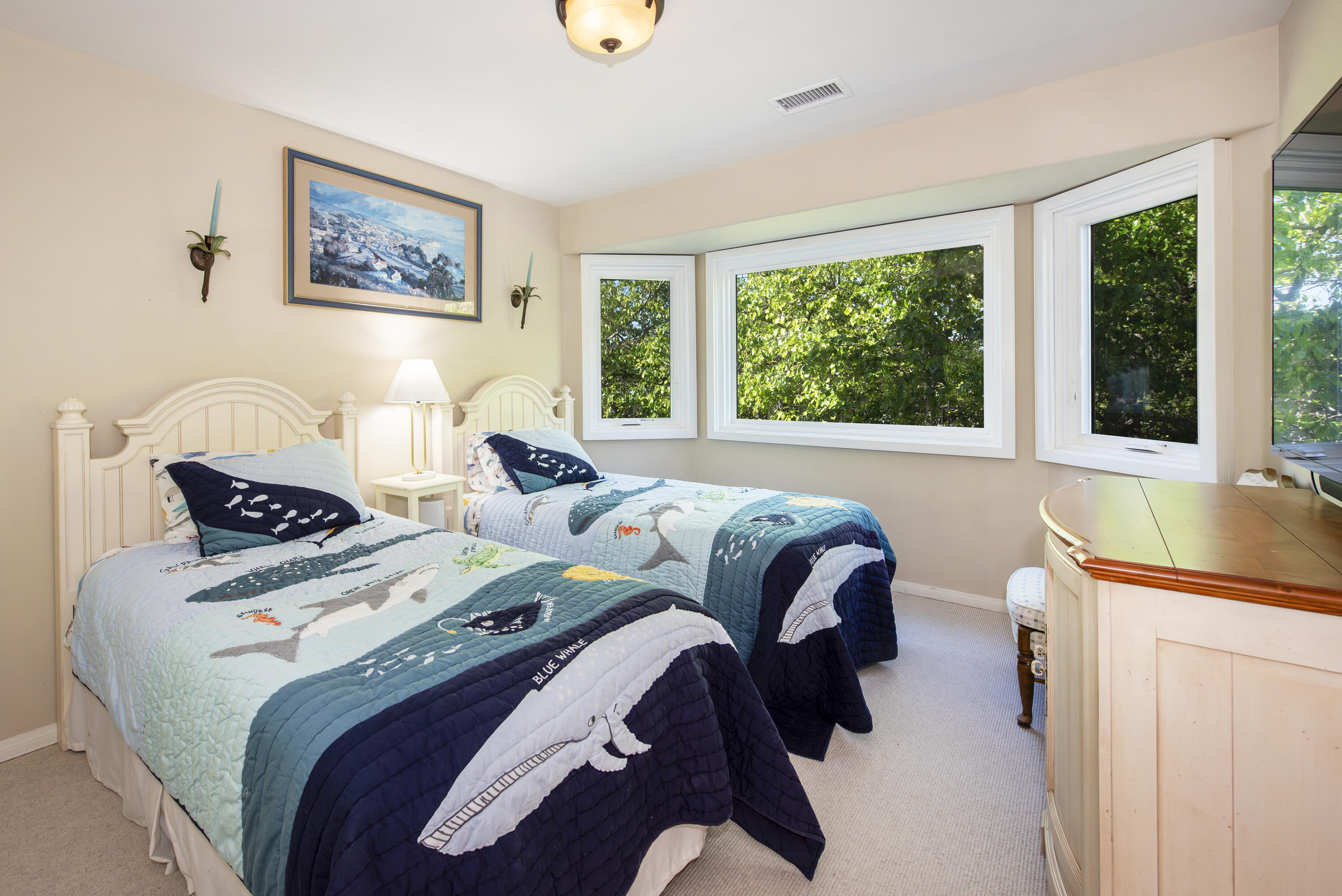 2525 Emerson Street Summerland, CA 93067 - Photo 16 of 26 a bedroom with two beds and a large window