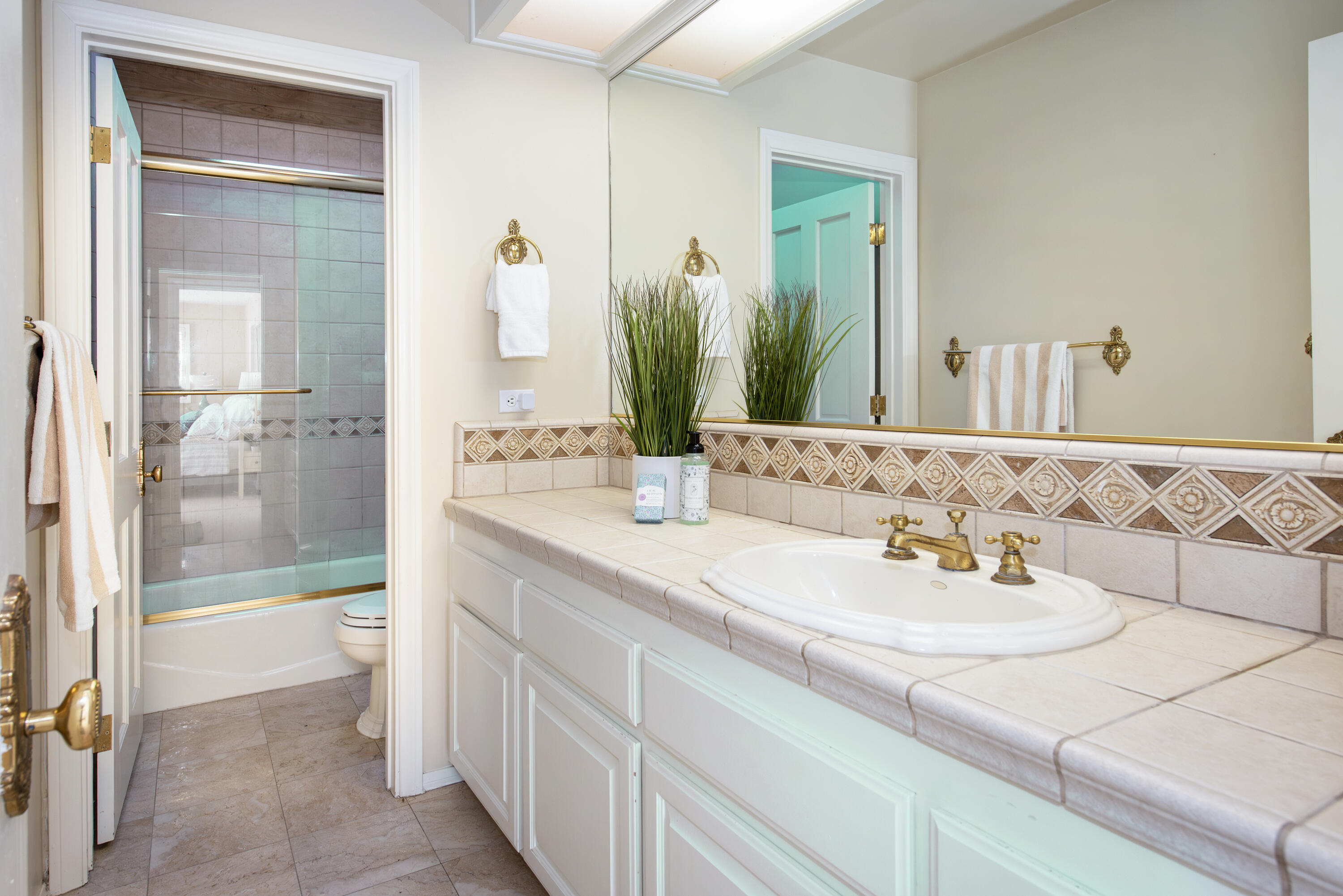 2525 Emerson Street Summerland, CA 93067 - Photo 17 of 26 a bathroom with a sink and a mirror