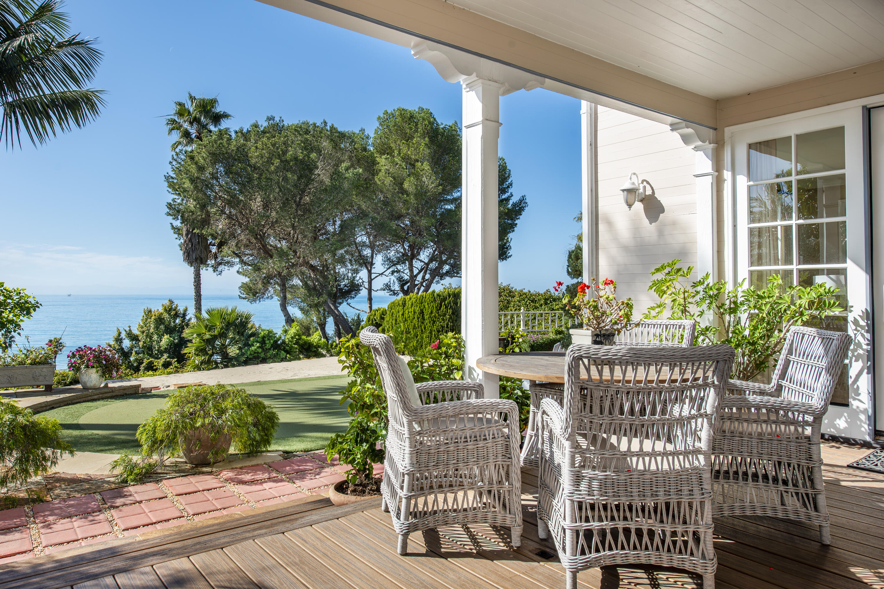 2525 Emerson Street Summerland, CA 93067 - Photo 18 of 26 a view of a chair and table in backyard of the house