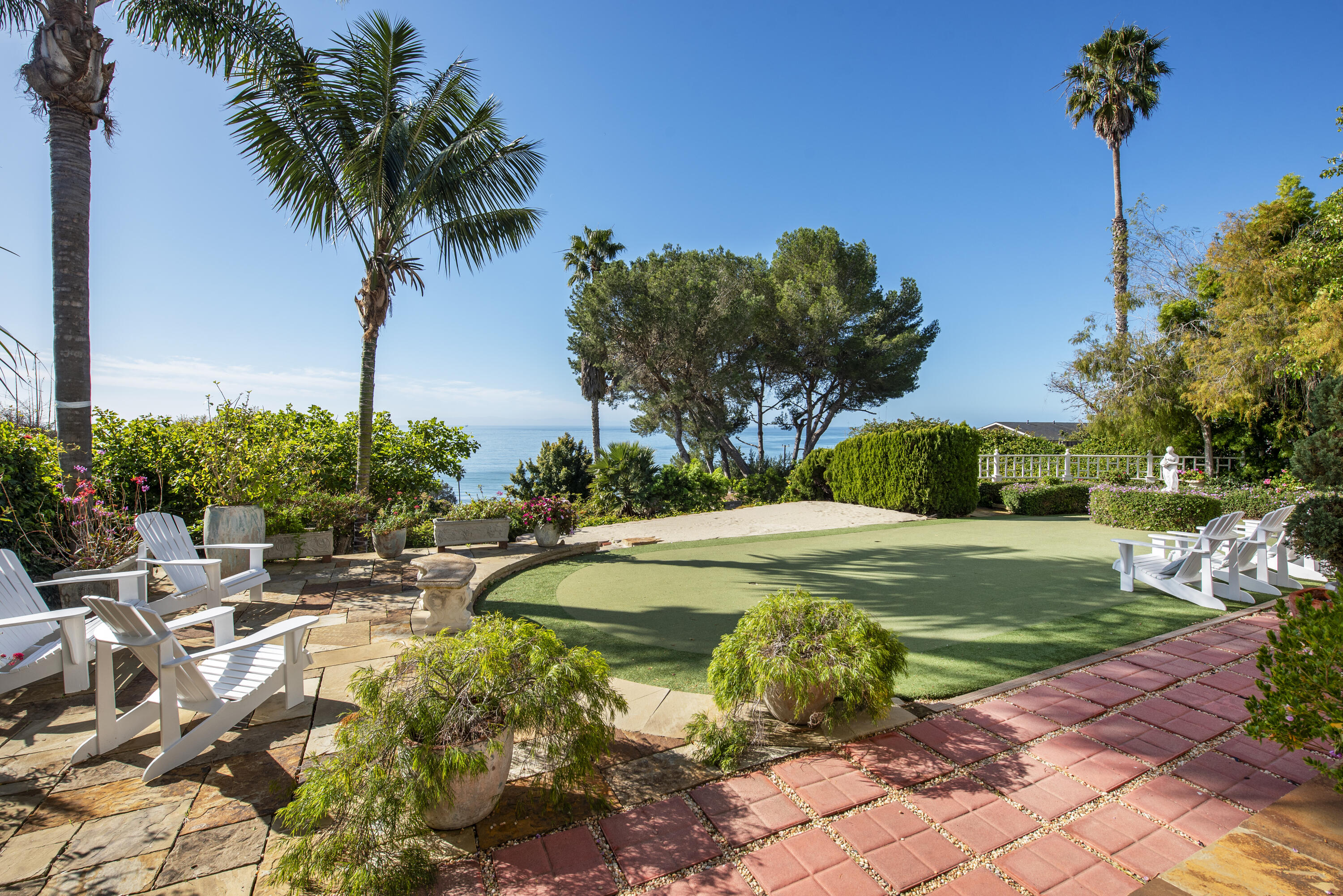 2525 Emerson Street Summerland, CA 93067 - Photo 2 of 26 a view of a swimming pool and lounge chairs