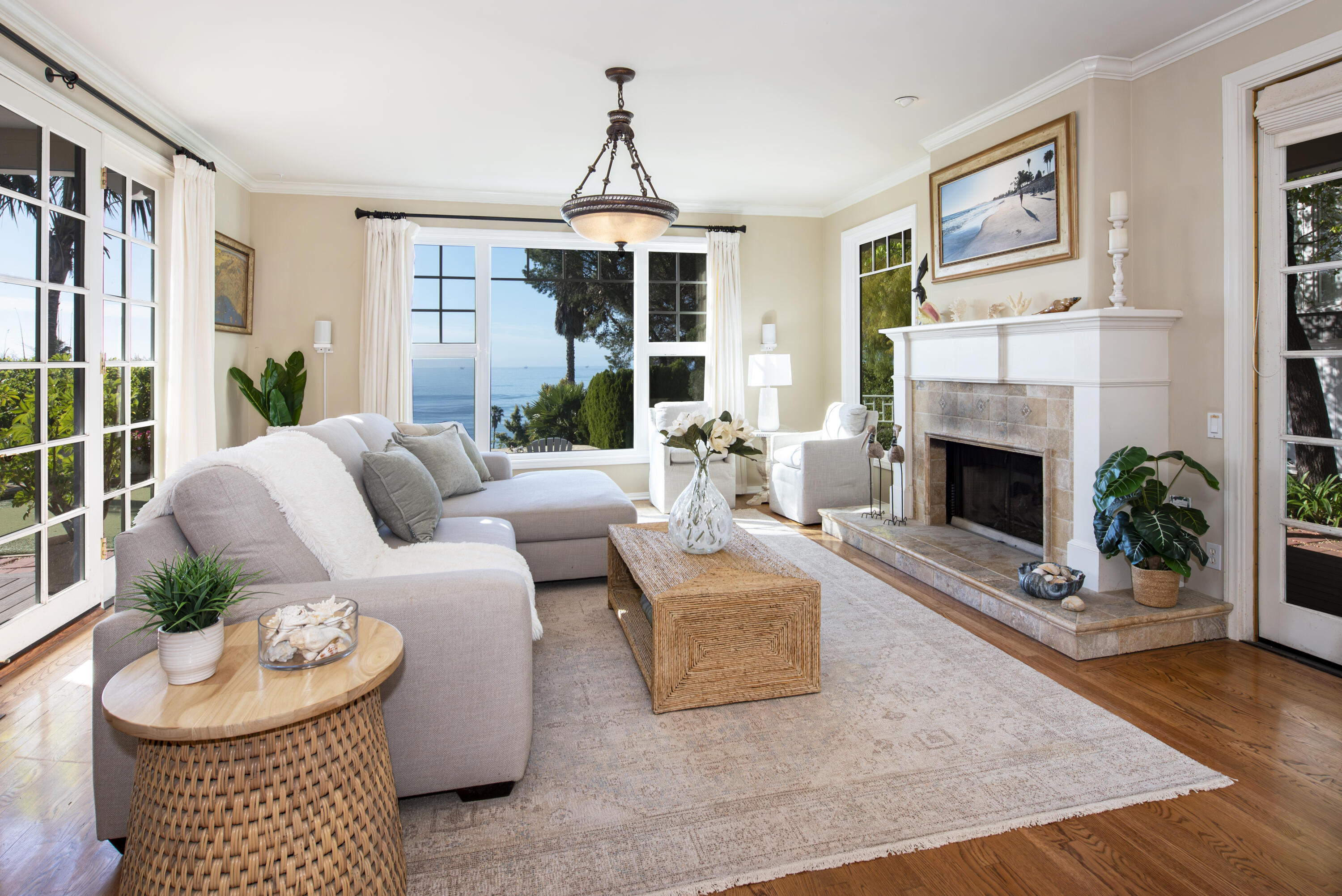 2525 Emerson Street Summerland, CA 93067 - Photo 4 of 26 a living room with furniture a fireplace and a large window