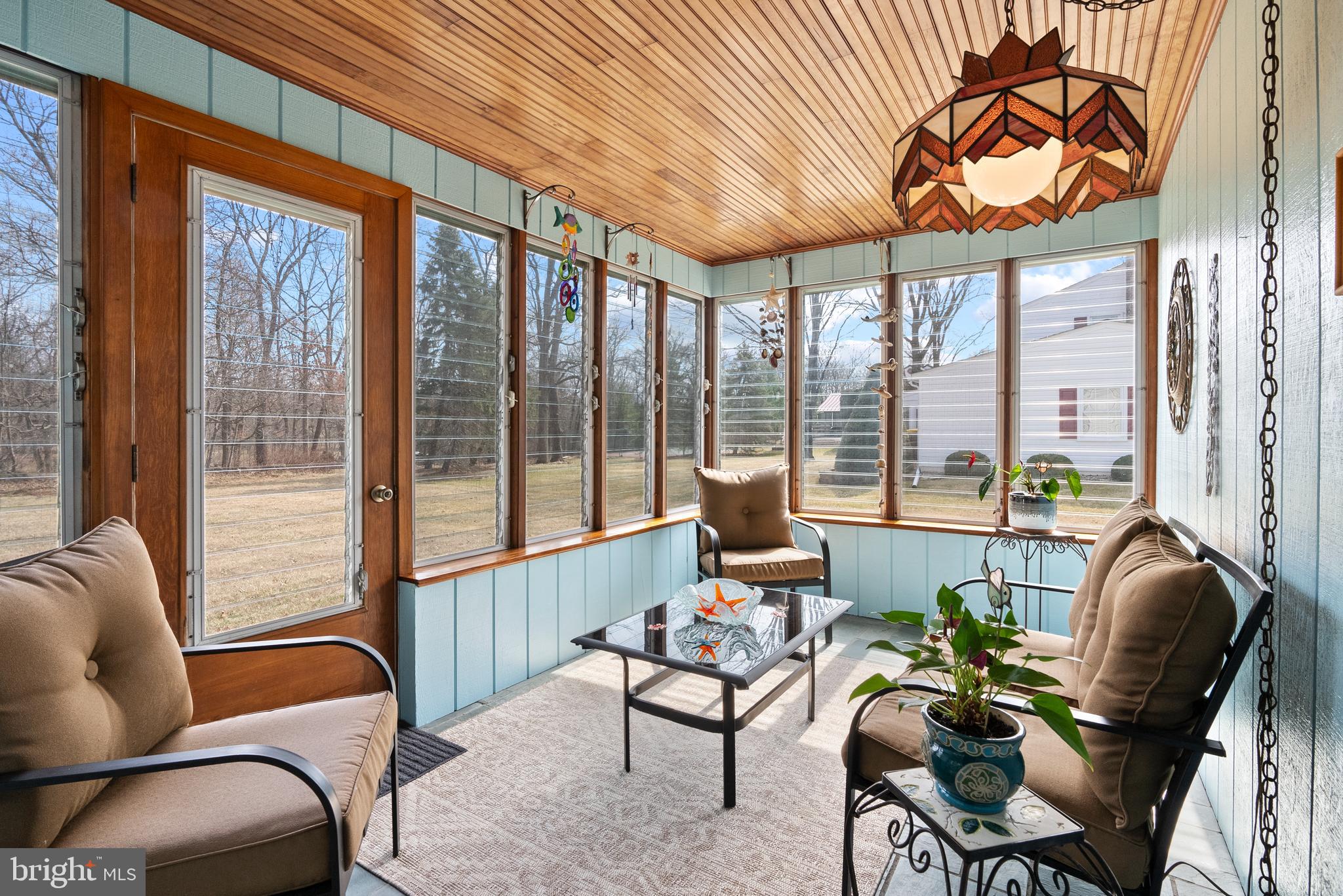 222 Brookside Circle Harleysville, PA 19438 - Photo 15 of 34 a living room with furniture and floor to ceiling windows