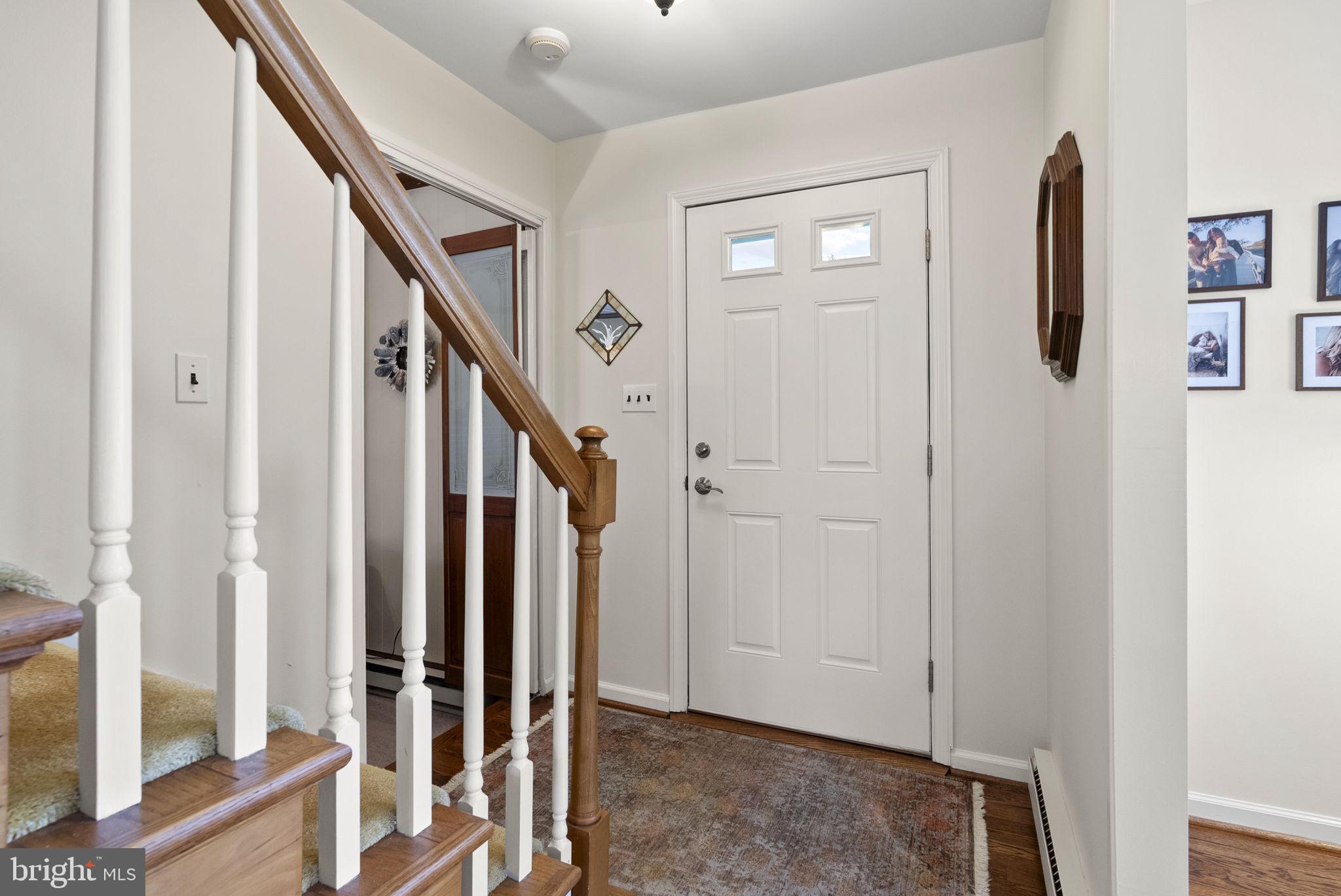 222 Brookside Circle Harleysville, PA 19438 - Photo 18 of 34 a view of an entryway with staircase