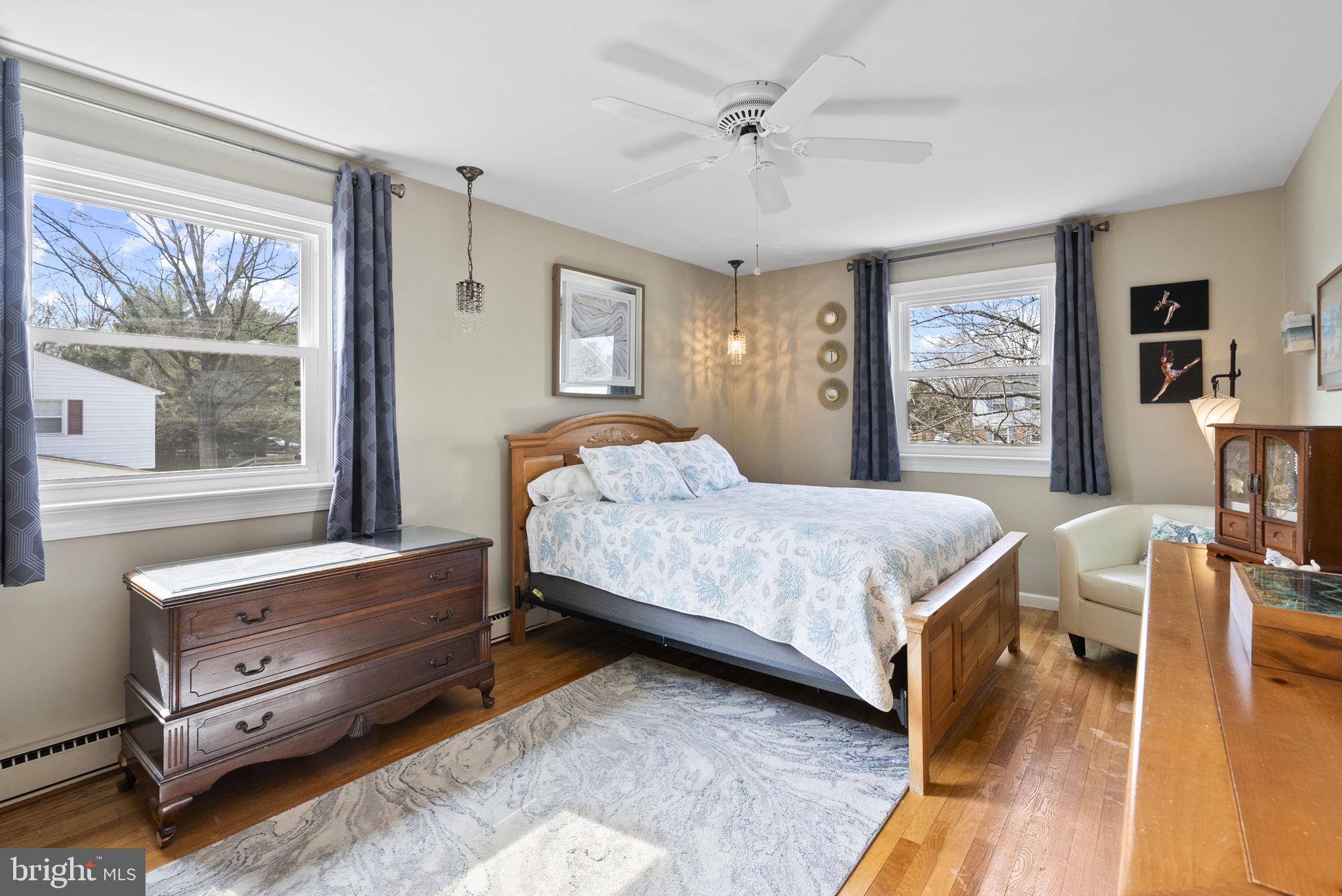 222 Brookside Circle Harleysville, PA 19438 - Photo 20 of 34 a bedroom with a bed and large window