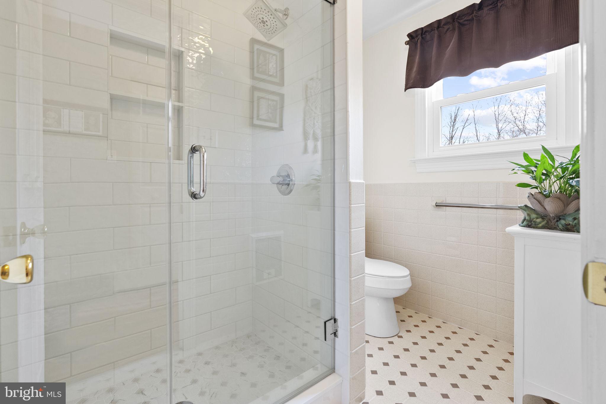 222 Brookside Circle Harleysville, PA 19438 - Photo 21 of 34 a bathroom with a toilet and a shower