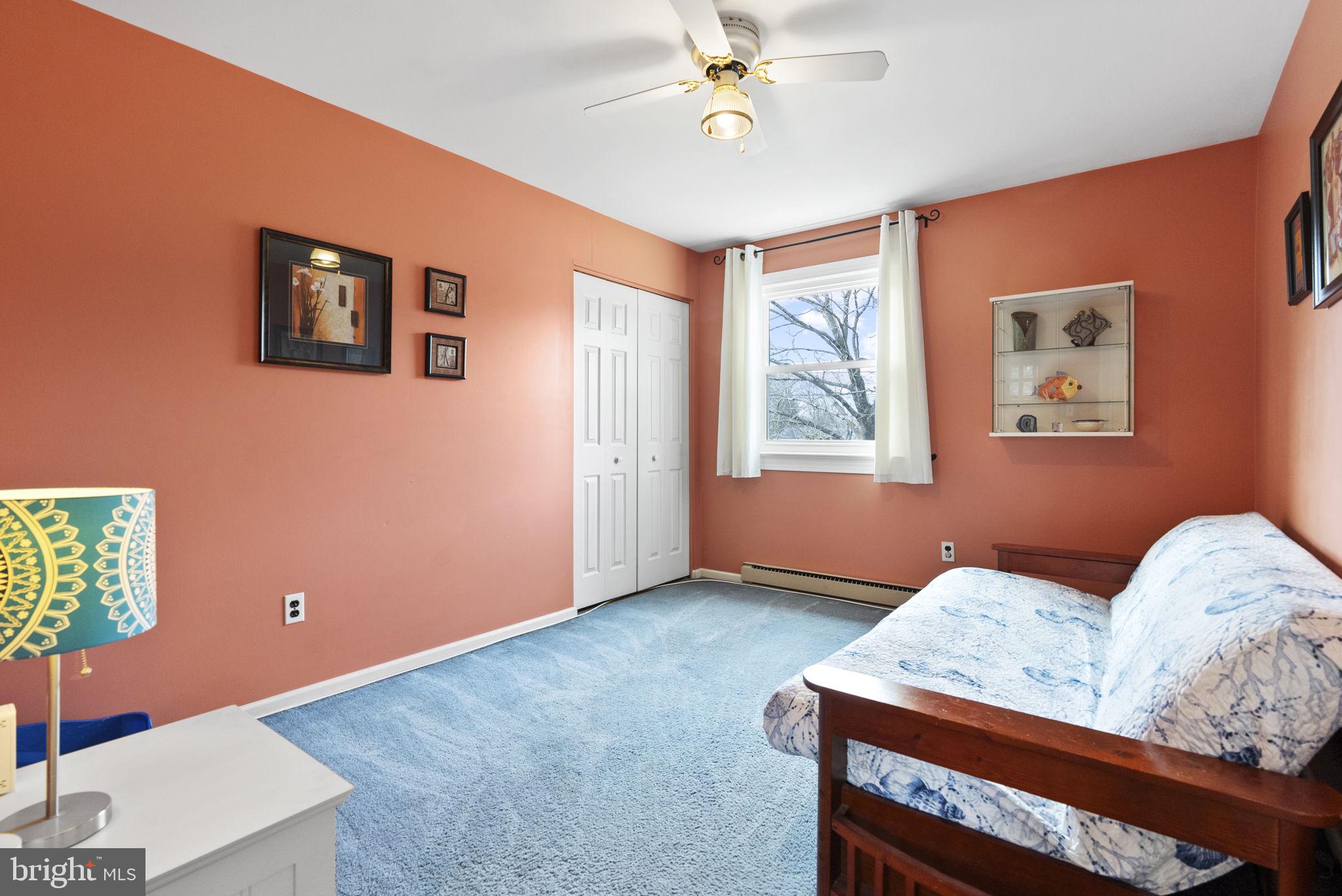222 Brookside Circle Harleysville, PA 19438 - Photo 23 of 34 a bedroom with furniture and a window