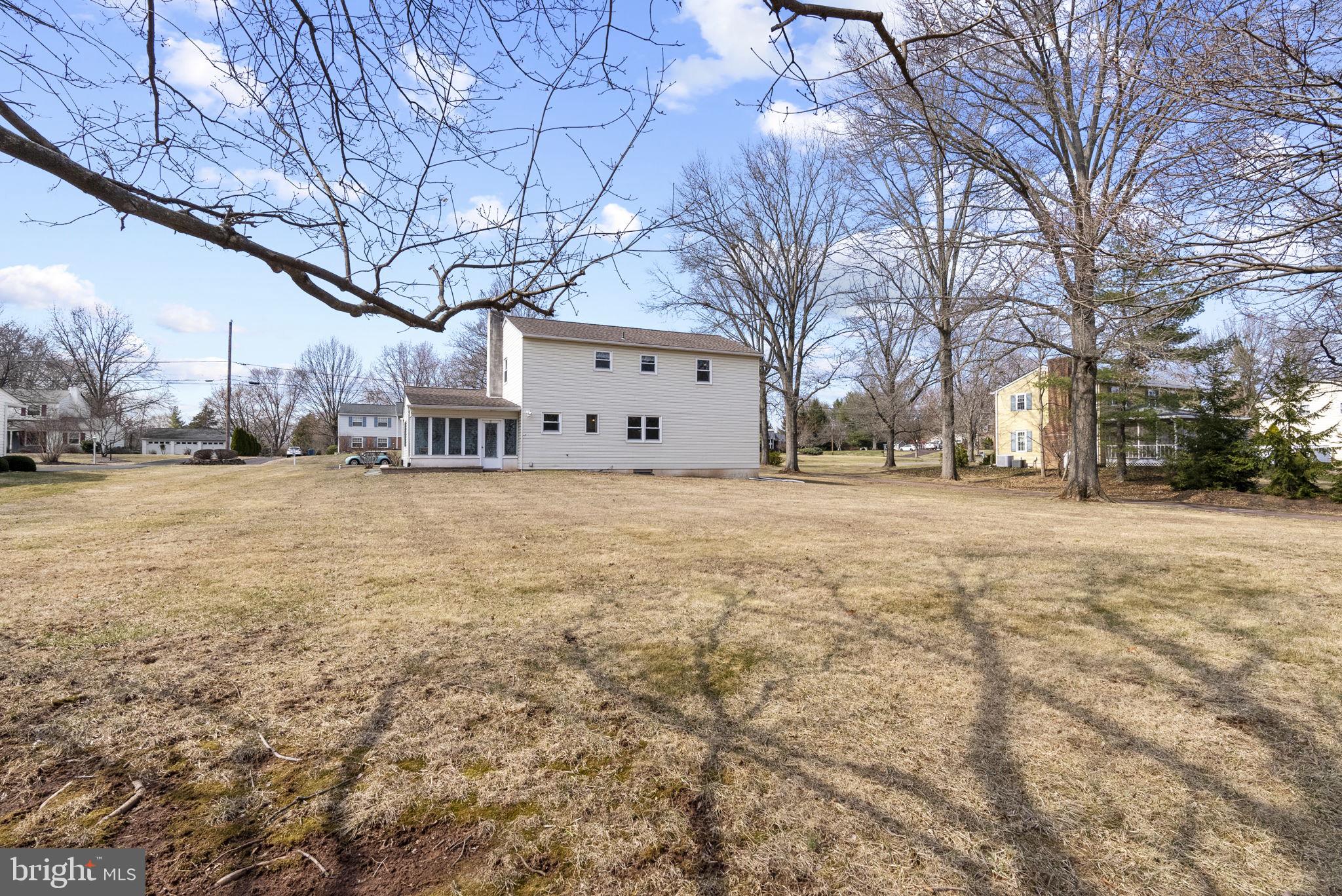 222 Brookside Circle Harleysville, PA 19438 - Photo 30 of 34 a view of a yard with large trees