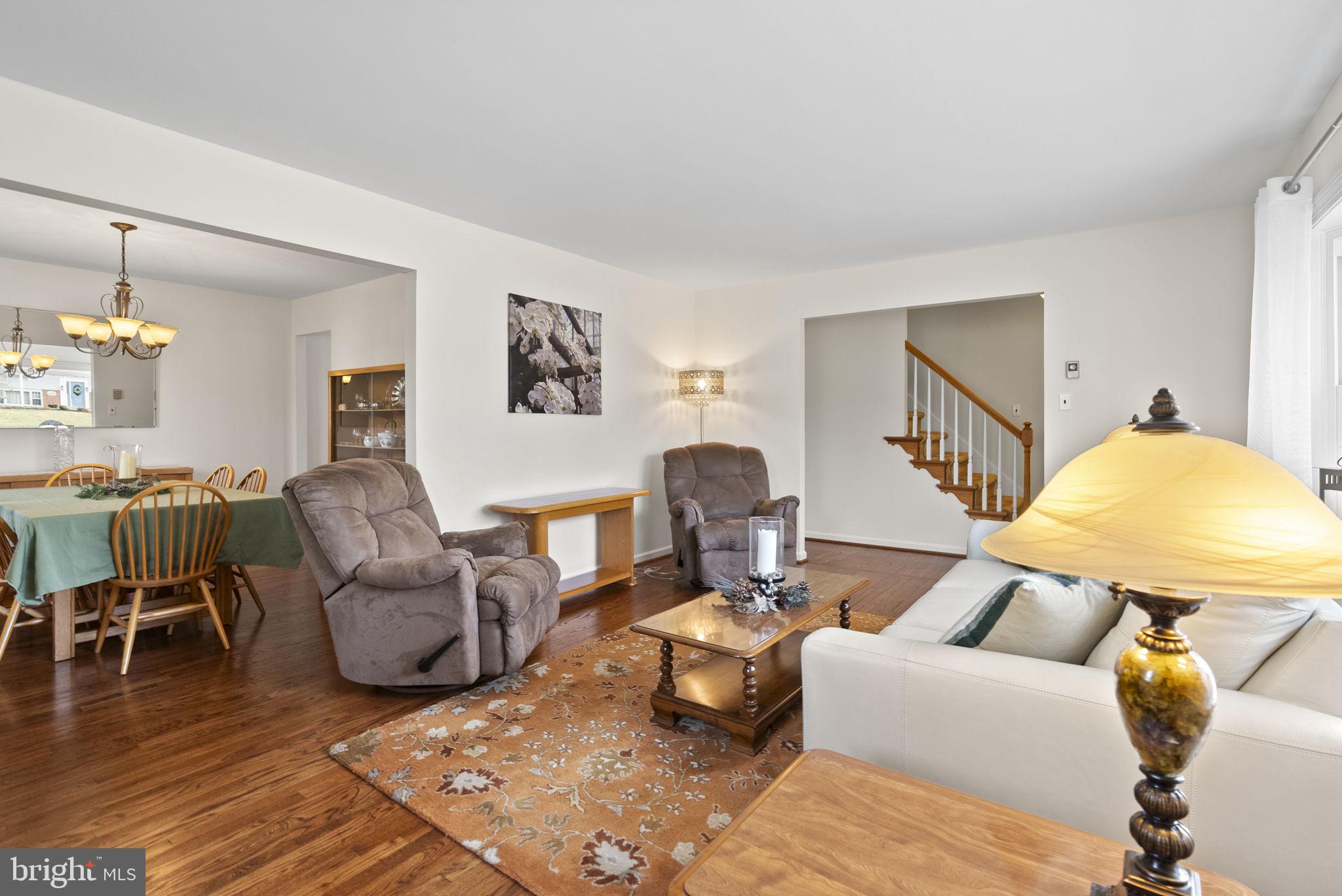 222 Brookside Circle Harleysville, PA 19438 - Photo 7 of 34 a living room with furniture and wooden floor