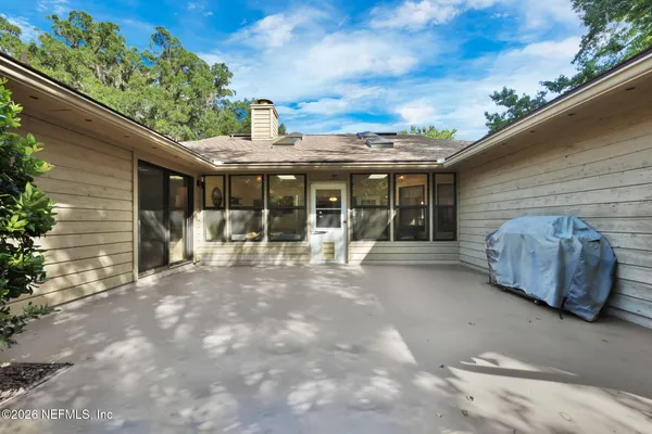a view of a terrace with sitting area