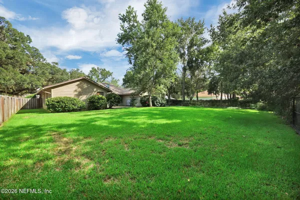 a view of a house with a park