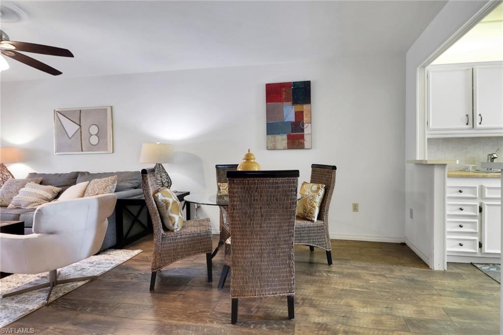 1021 3rd Street South, Unit 306 Naples, FL 34102 - Photo 13 of 24 a workspace with furniture and window