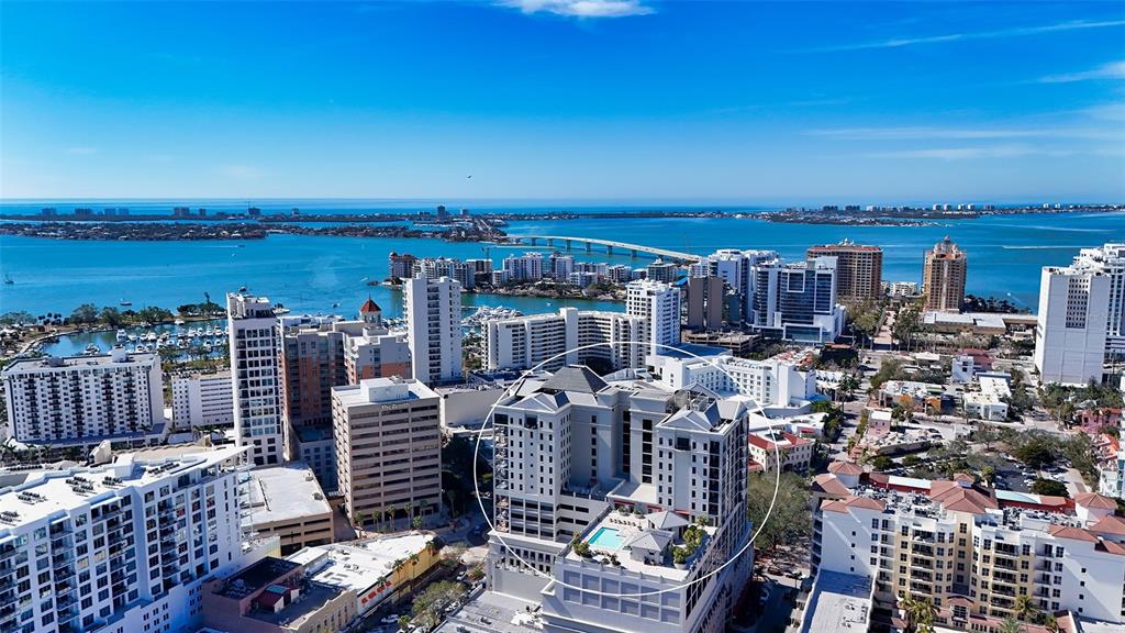 a view of city with ocean