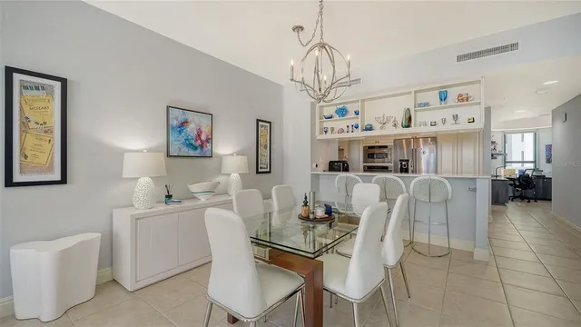 a bedroom with a large bed and a large window