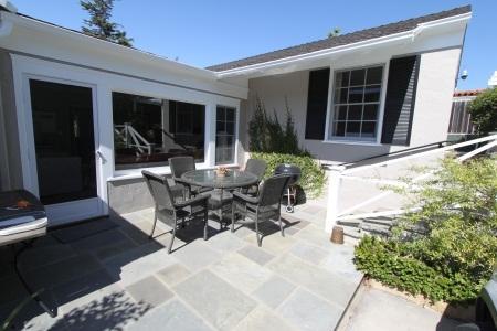 2324 State Street Santa Barbara, CA 93105 - Photo 1 of 11 a view of a patio with table and chairs and potted plants