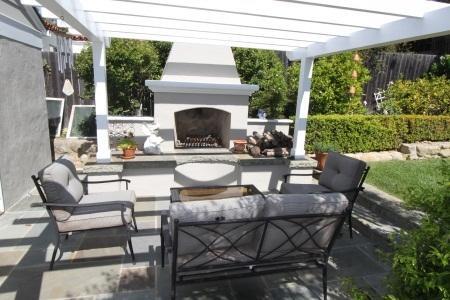 2324 State Street Santa Barbara, CA 93105 - Photo 2 of 11 a view of a patio with a dining table and chairs