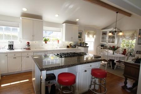 2324 State Street Santa Barbara, CA 93105 - Photo 8 of 11 a kitchen with stainless steel appliances granite countertop a stove a sink and a refrigerator