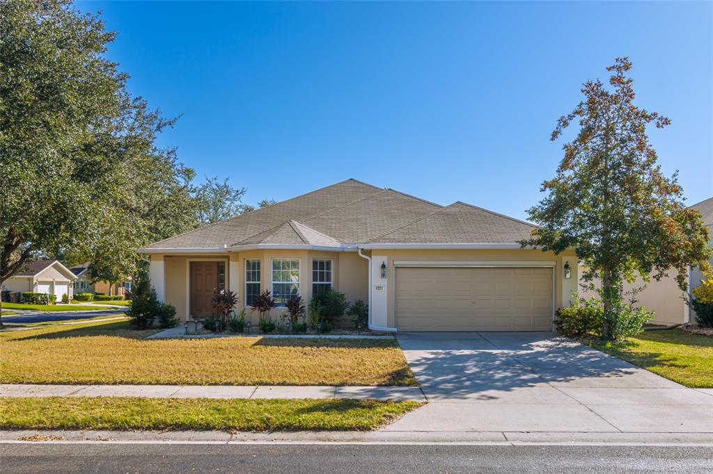 4201 Southwest 54th Court Ocala, FL 34474 - Photo 1 of 1 a front view of a house with a garden