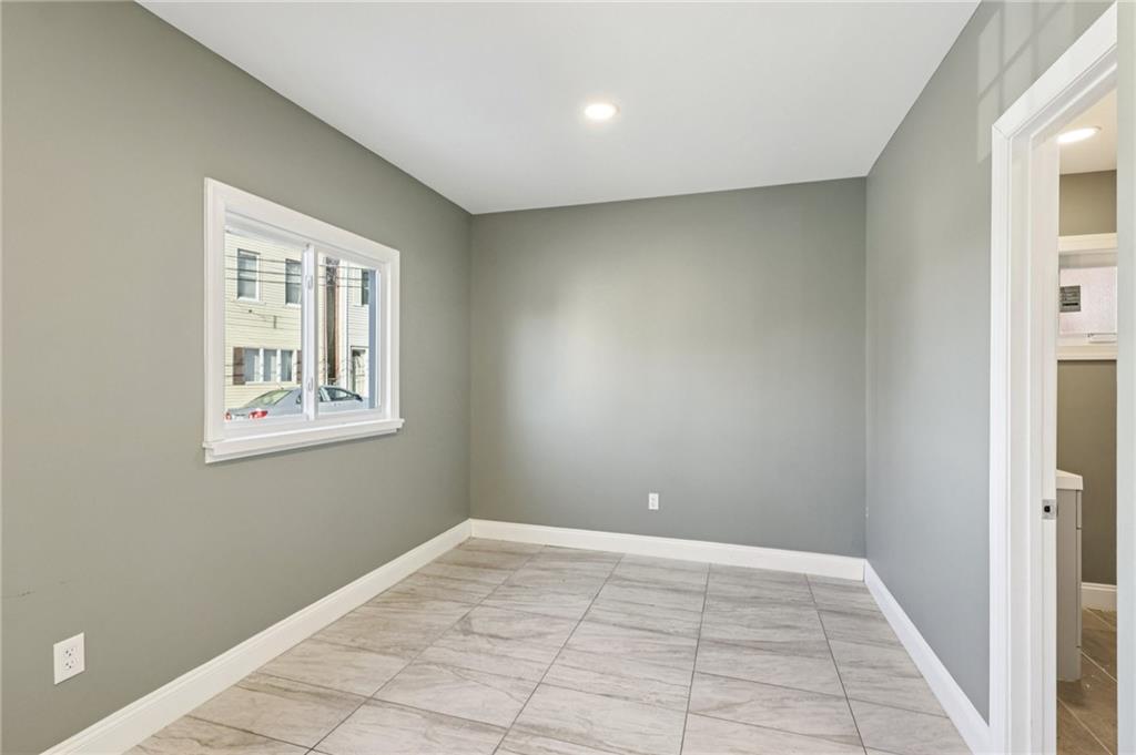 5256 Wickliff Street Pittsburgh, PA 15201 - Photo 17 of 49 a view of an empty room with a window