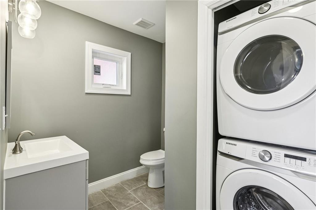 5256 Wickliff Street Pittsburgh, PA 15201 - Photo 18 of 49 a bathroom with a toilet and a sink