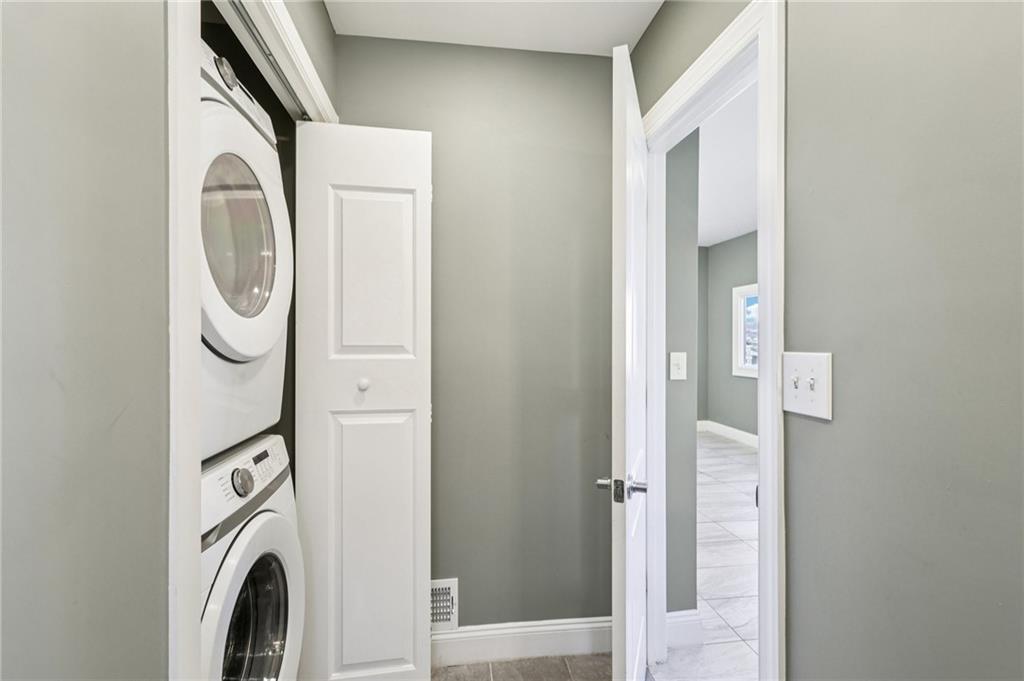 5256 Wickliff Street Pittsburgh, PA 15201 - Photo 19 of 49 a utility room with dryer and washer