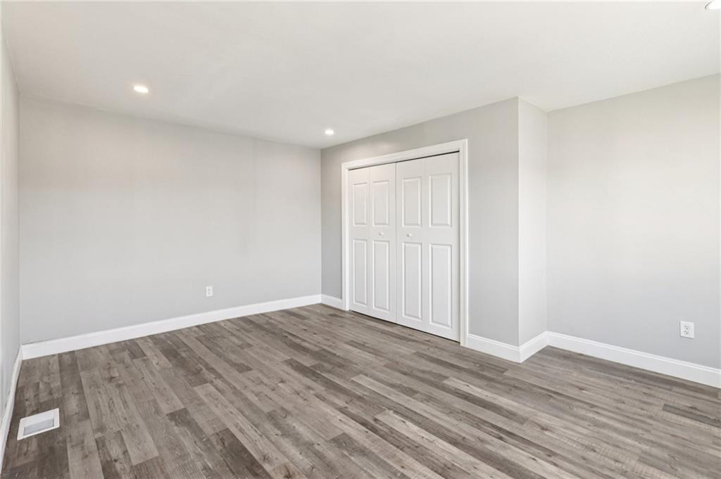 5256 Wickliff Street Pittsburgh, PA 15201 - Photo 22 of 49 a view of an empty room with wooden floor