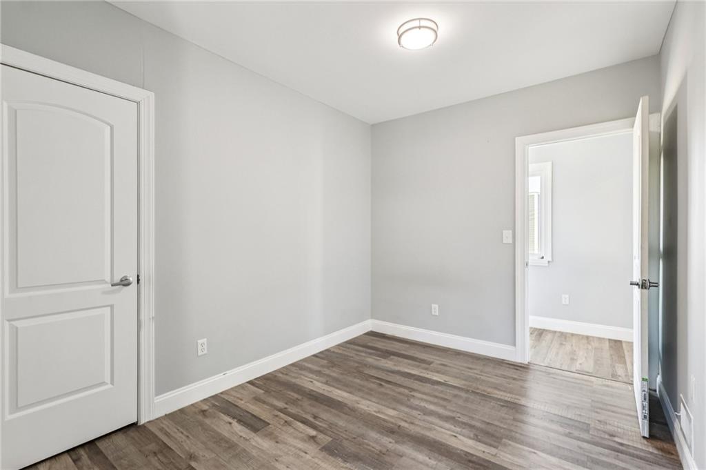 5256 Wickliff Street Pittsburgh, PA 15201 - Photo 27 of 49 wooden floor in an empty room