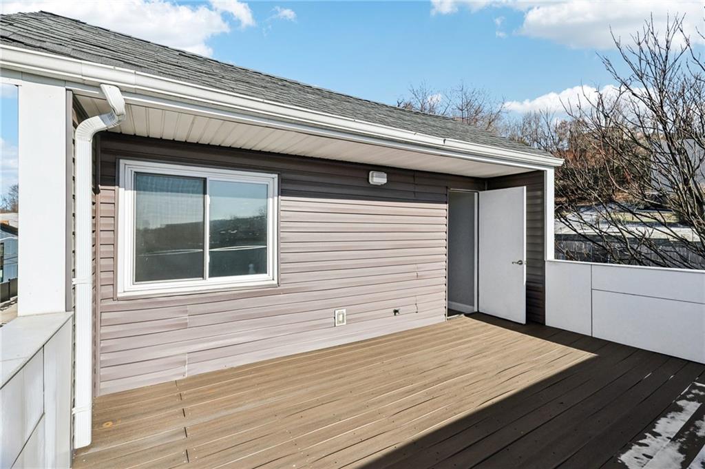 5256 Wickliff Street Pittsburgh, PA 15201 - Photo 42 of 49 a view of a backyard of a house