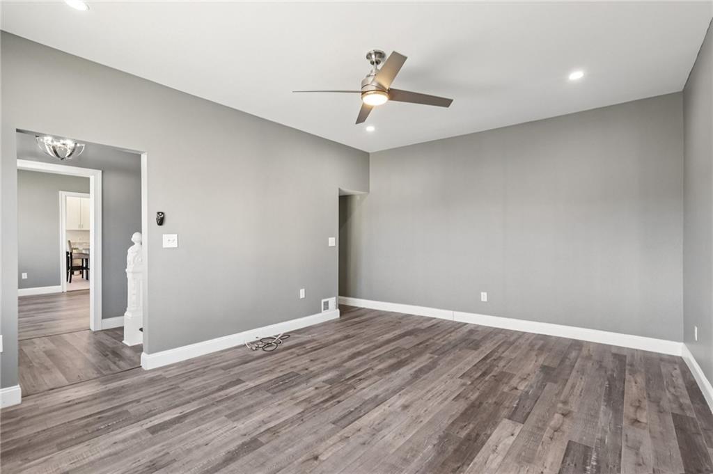 5256 Wickliff Street Pittsburgh, PA 15201 - Photo 7 of 49 wooden floor in an empty room with a window