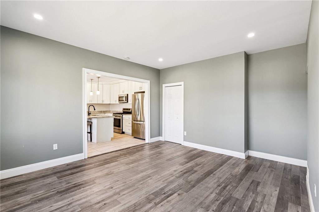 5256 Wickliff Street Pittsburgh, PA 15201 - Photo 8 of 49 a view of a kitchen with wooden floor