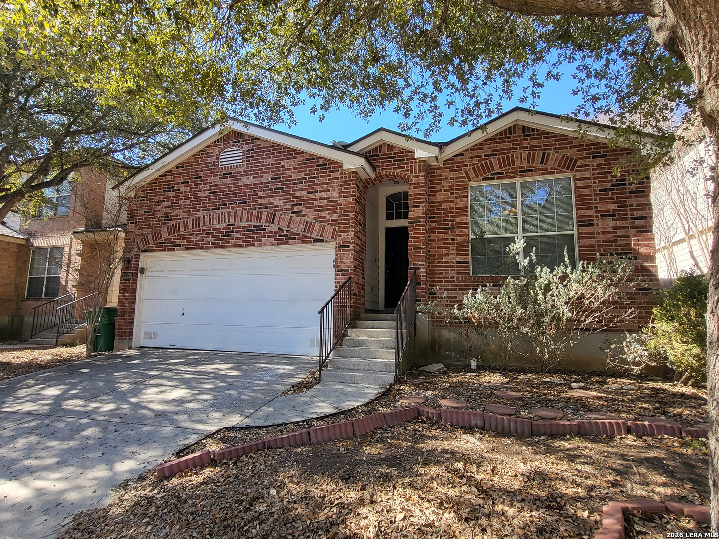 5411 Excello Path San Antonio, TX 78247 - Photo 1 of 29 a front view of a house with a yard