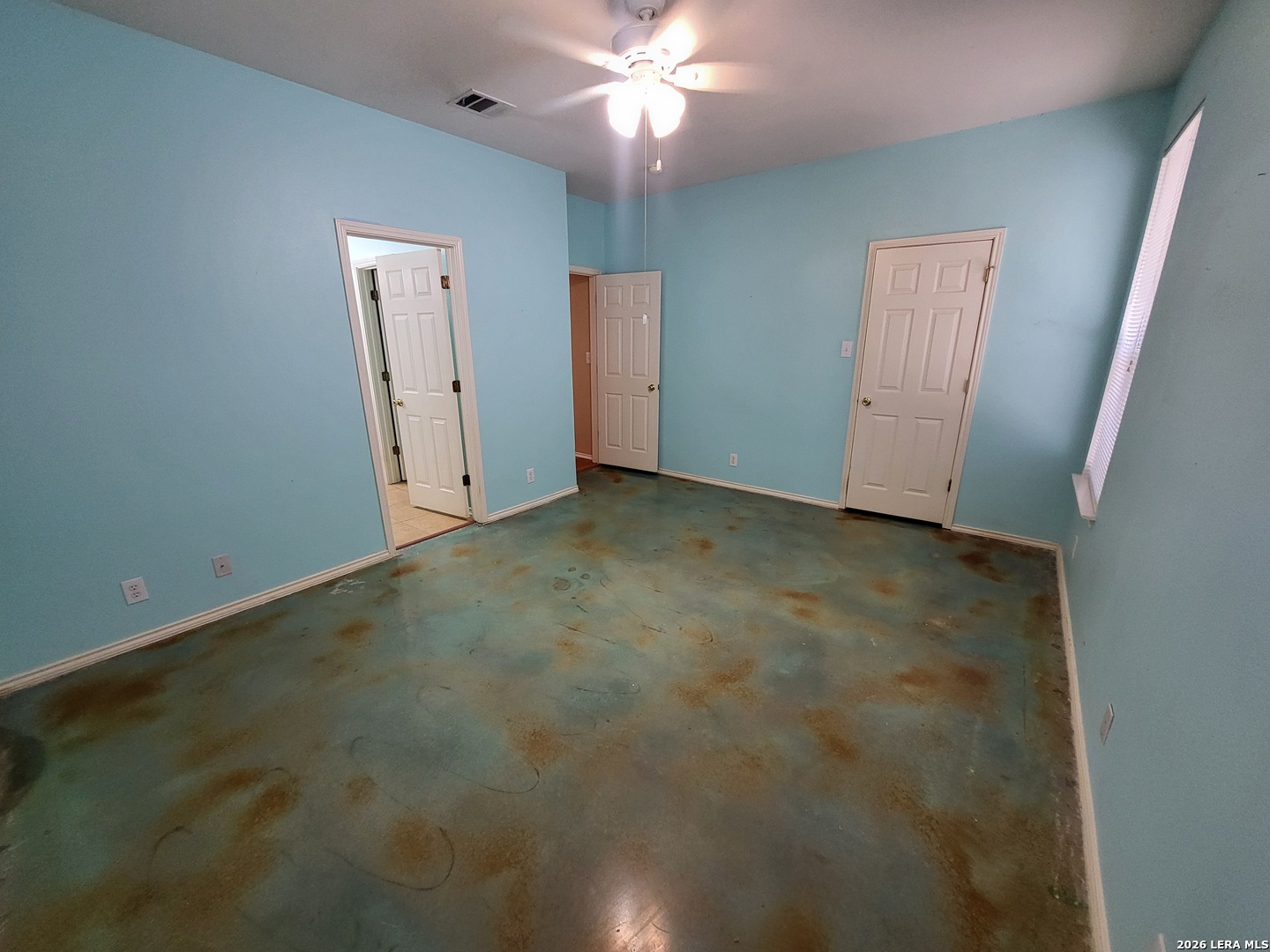 5411 Excello Path San Antonio, TX 78247 - Photo 14 of 29 an empty room with closet and a chandelier fan