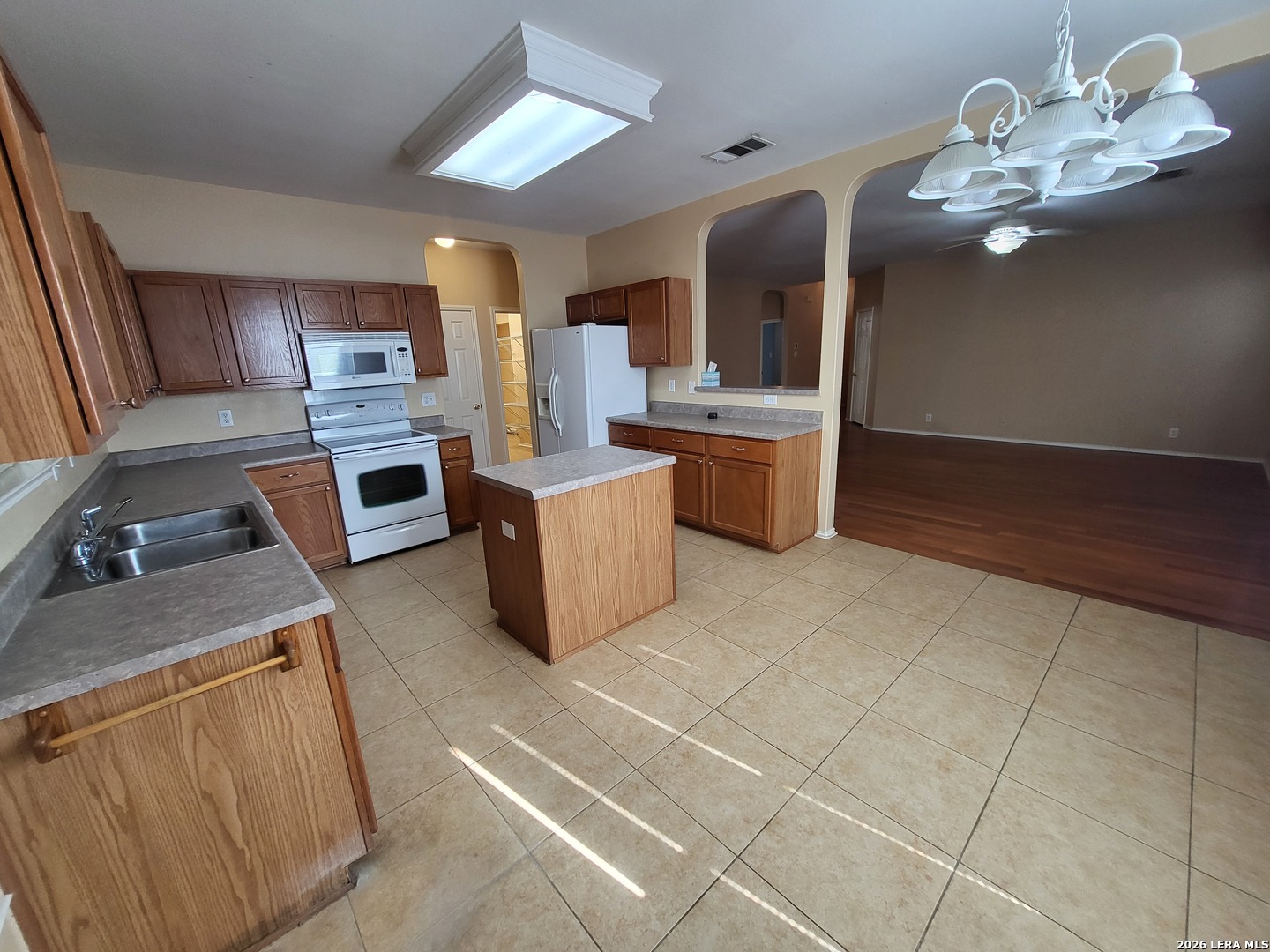 5411 Excello Path San Antonio, TX 78247 - Photo 9 of 29 a view of kitchen with sink microwave and cabinets