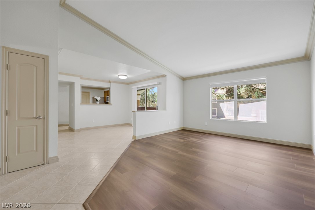 8101 West Flamingo Road, Unit 2136 Las Vegas, NV 89147 - Photo 7 of 32 Clean lines and smooth flooring options define this versatile open living space.