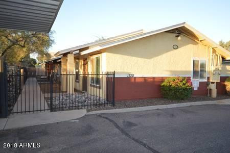 1320 West 3rd Street, Unit 2 Tempe, AZ 85281 - Photo 2 of 10 a view of a house with a street