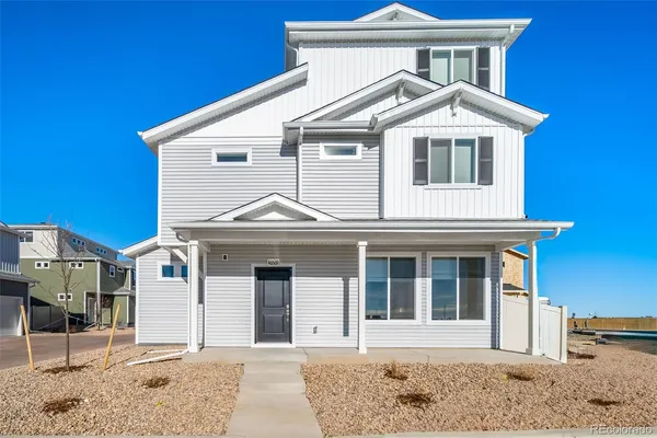 a front view of a house with a porch