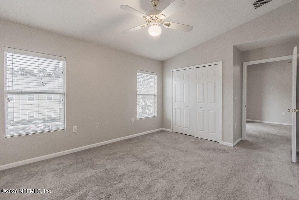 7920 Merrill Road, Unit 1511 Jacksonville, FL 32277 - Photo 25 of 32 a view of an empty room with a window