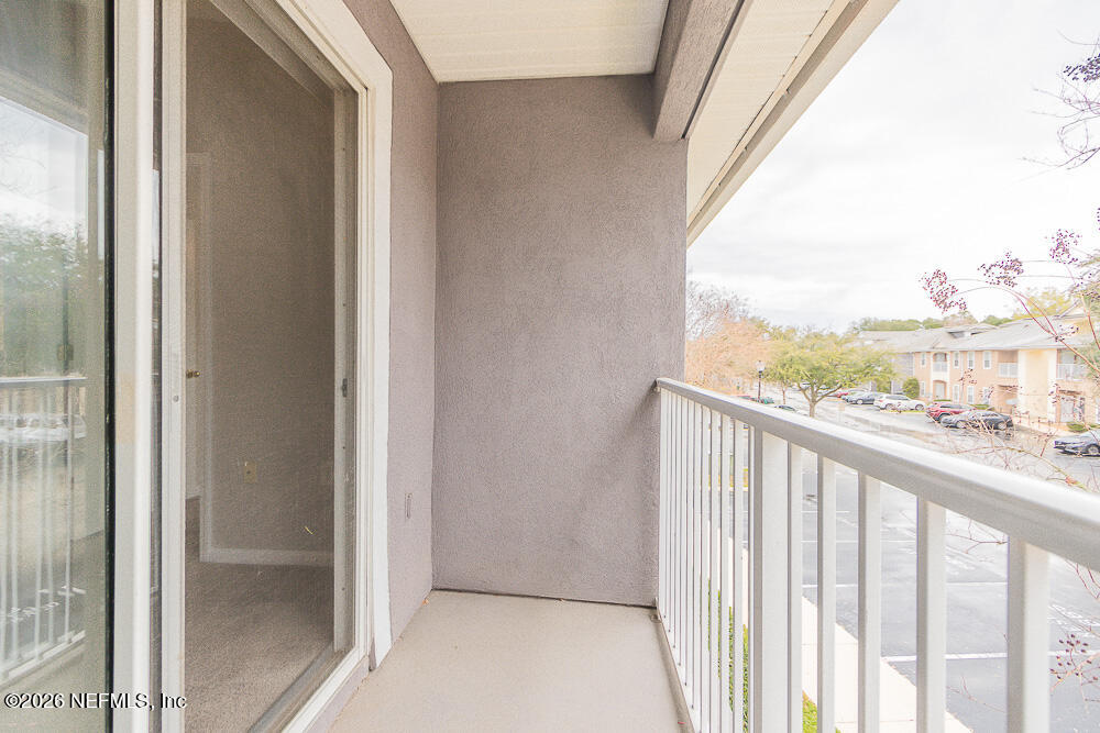 7920 Merrill Road, Unit 1511 Jacksonville, FL 32277 - Photo 28 of 32 a view of a balcony with city view