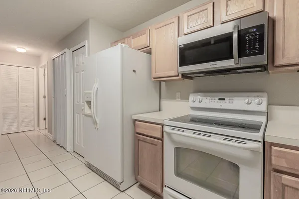 a building with cars parked in front of it