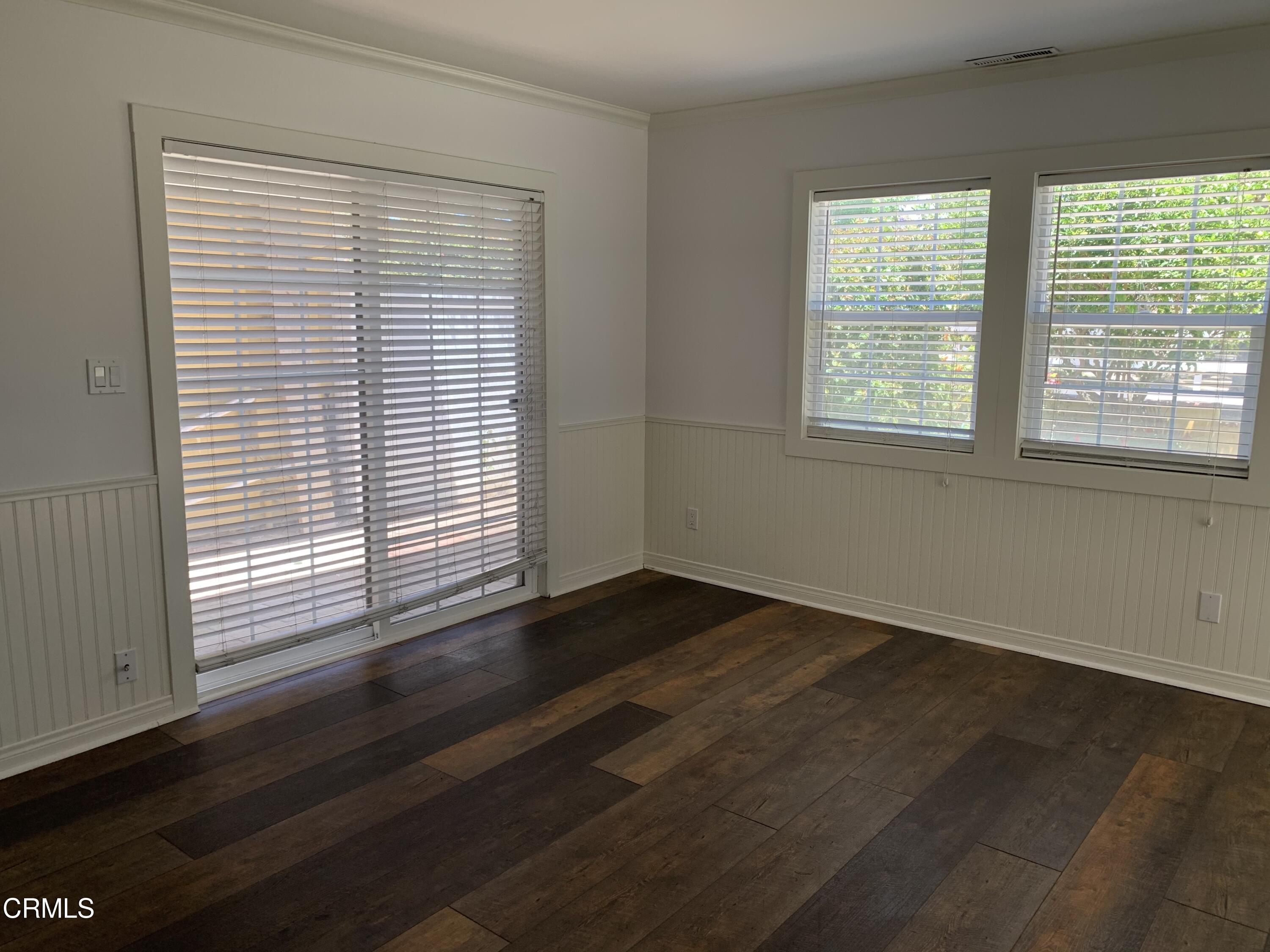 6009 La Cumbre Road Somis, CA 93066 - Photo 12 of 29 a view of an empty room with wooden floor and a window