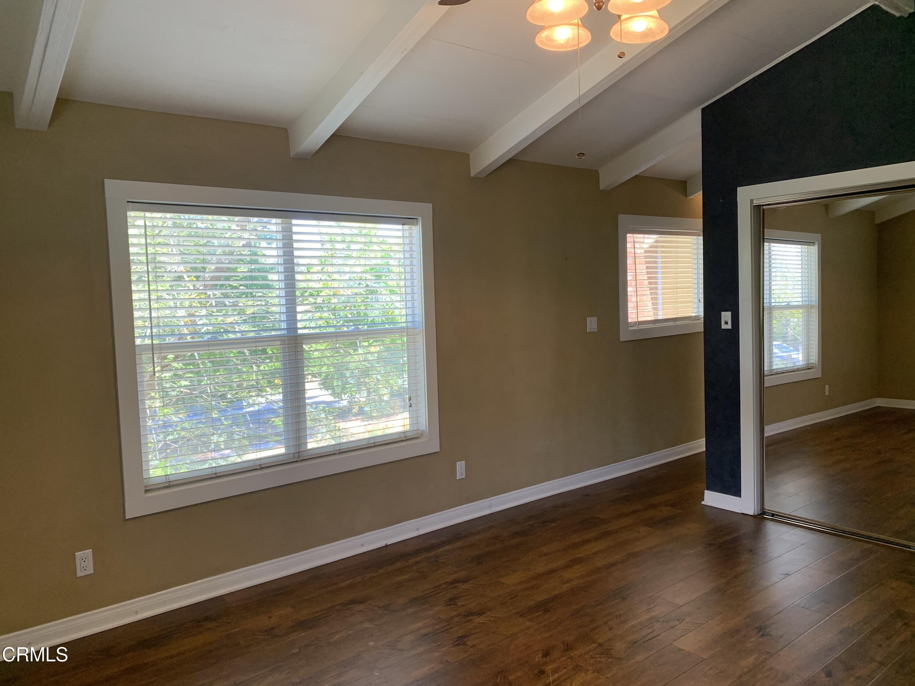 6009 La Cumbre Road Somis, CA 93066 - Photo 22 of 29 a view of an empty room with wooden floor and a window