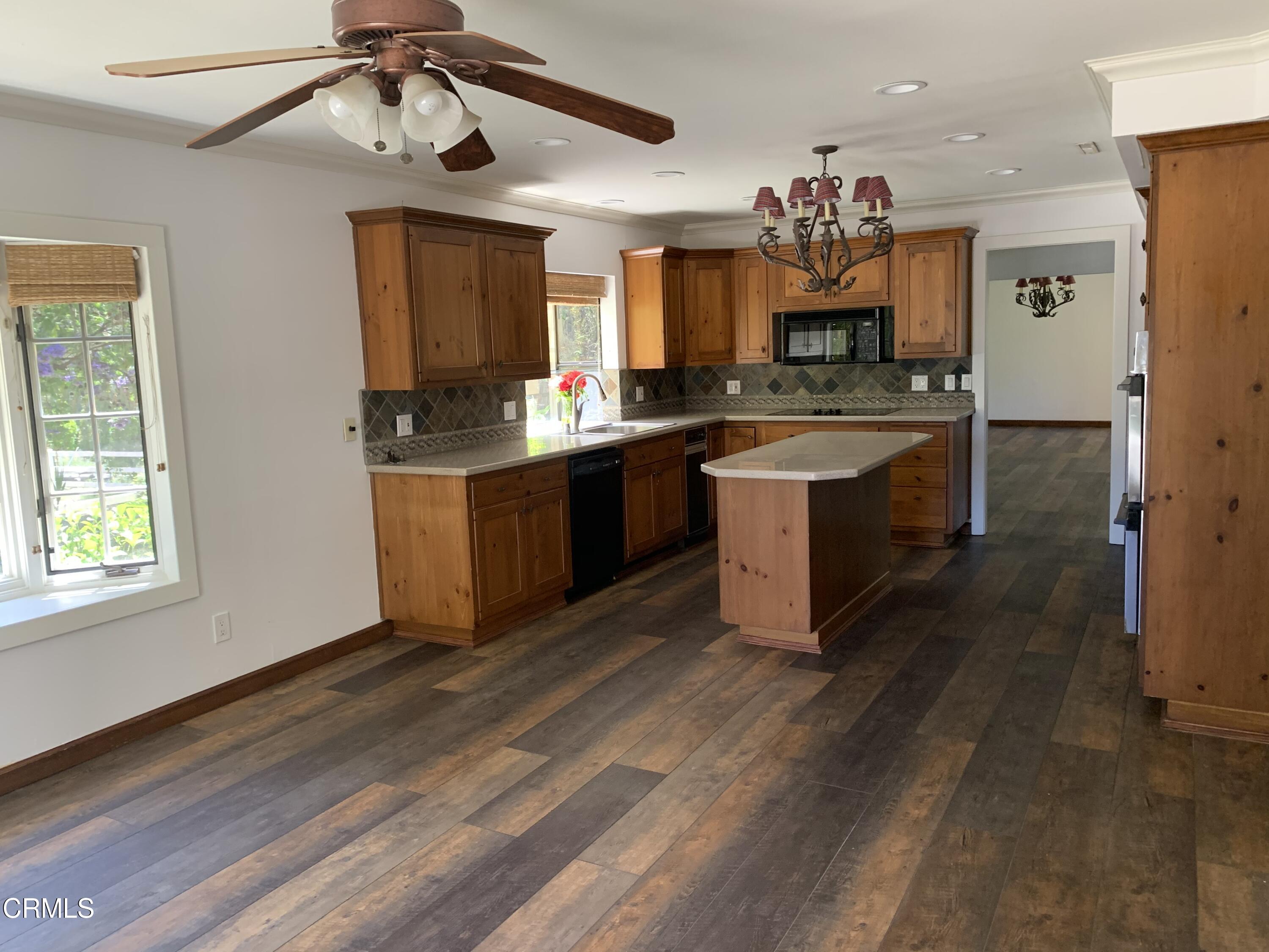 6009 La Cumbre Road Somis, CA 93066 - Photo 10 of 29 a large kitchen with a lot of counter space and a sink